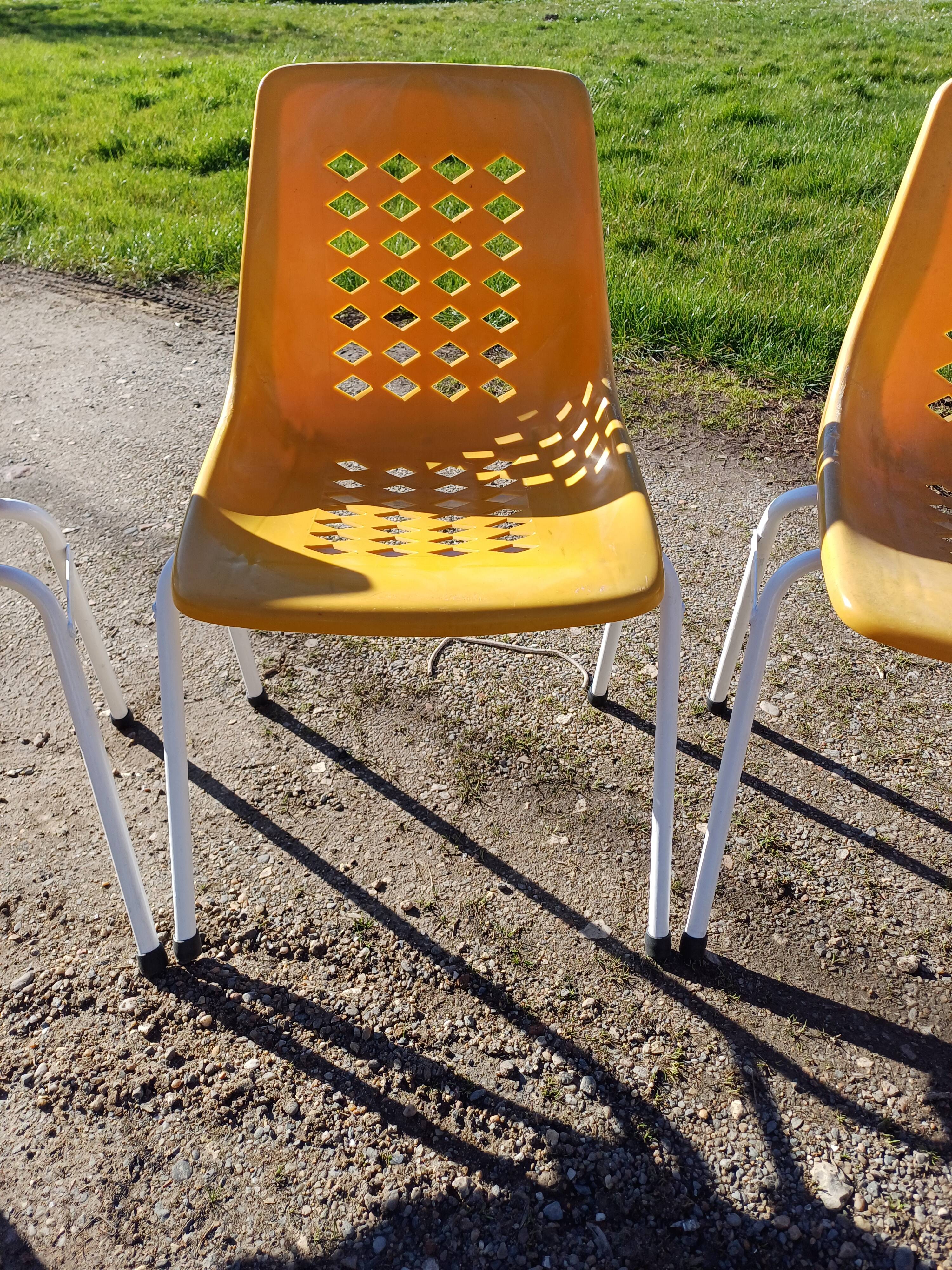 6 vintage iron and orange plastic garden chairs