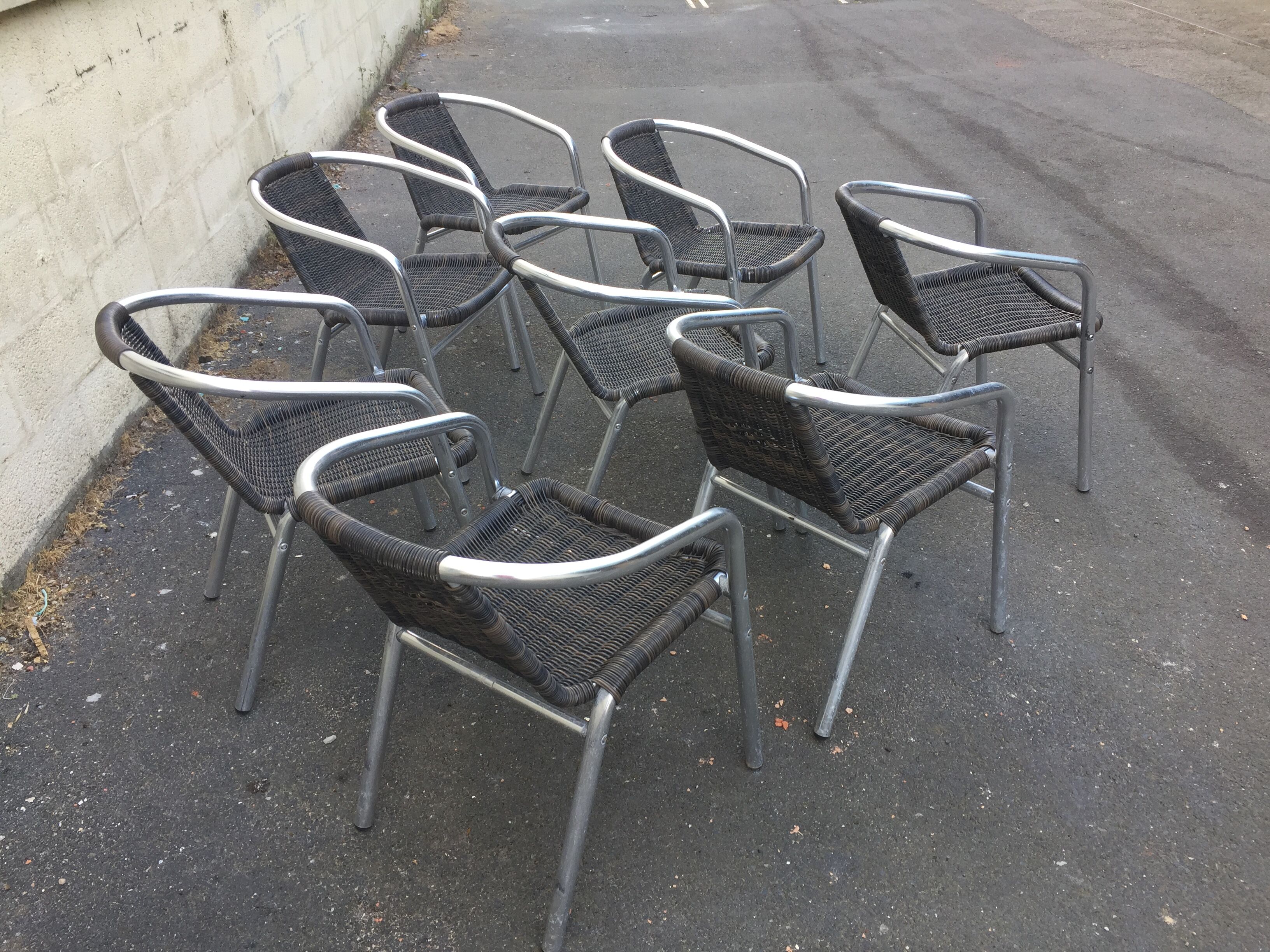 Eight Roland Vlaemynck aluminum coffee terrace armchairs (stackable)