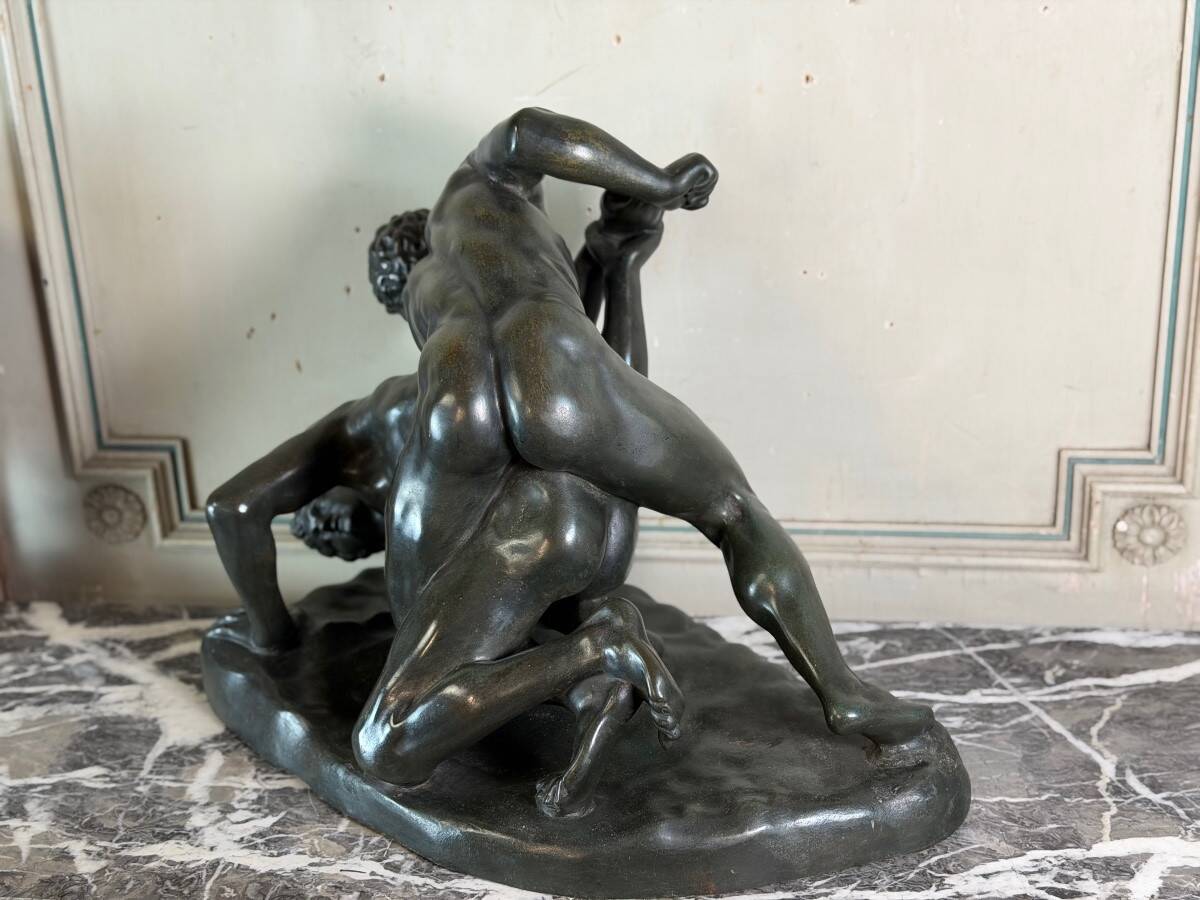 Large bronze after the antique preserved in the Uffizi in Florence, the wrestlers around 1880.