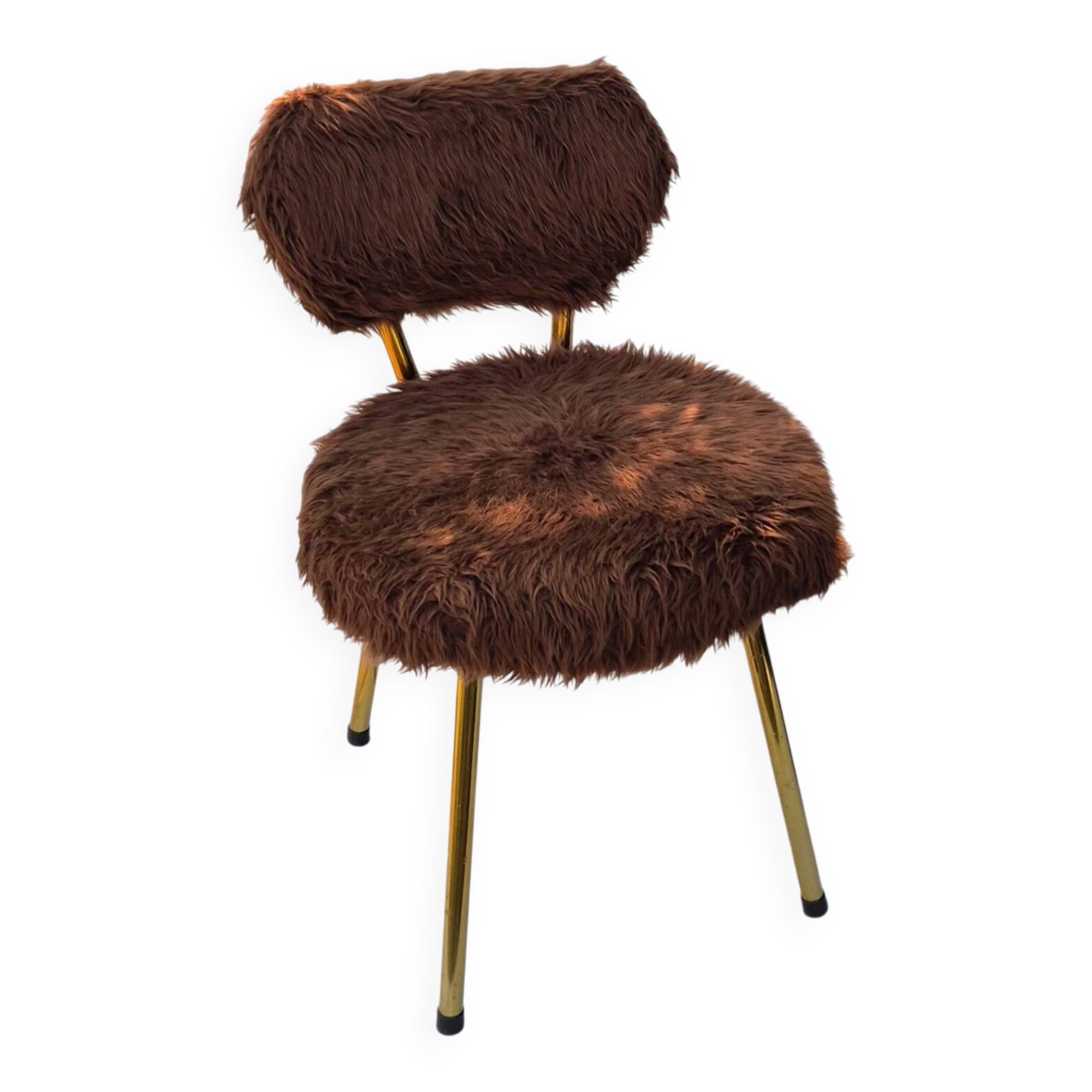 Vintage shaggy chair in faux fur with golden metal legs.