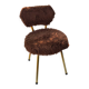 Vintage shaggy chair in faux fur with golden metal legs.
