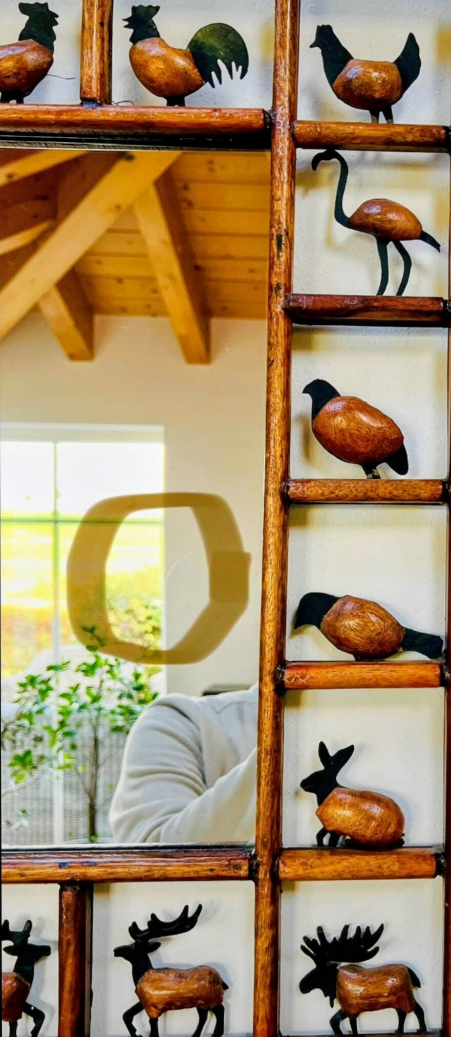 Wrought iron wood animal mirror