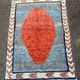 Handmade wool Berber rug with long pile, 110x150cm.