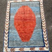 Handmade wool Berber rug with long pile, 110x150cm.