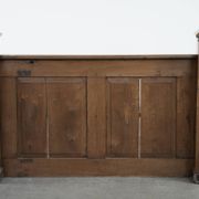 Antique oak church bench in Gothic style with beautiful wood carving