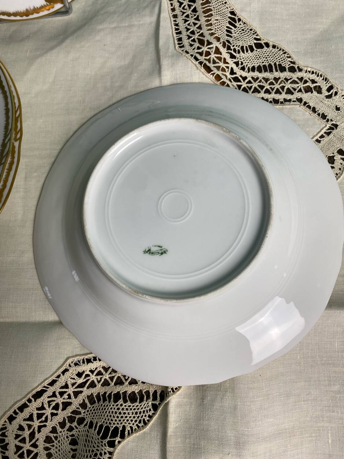 4 deep plates from Limoges with the PJC gold monogram.