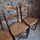Set of 4 antique dining chairs with caned seats, beech, France, circa 1900–1920.