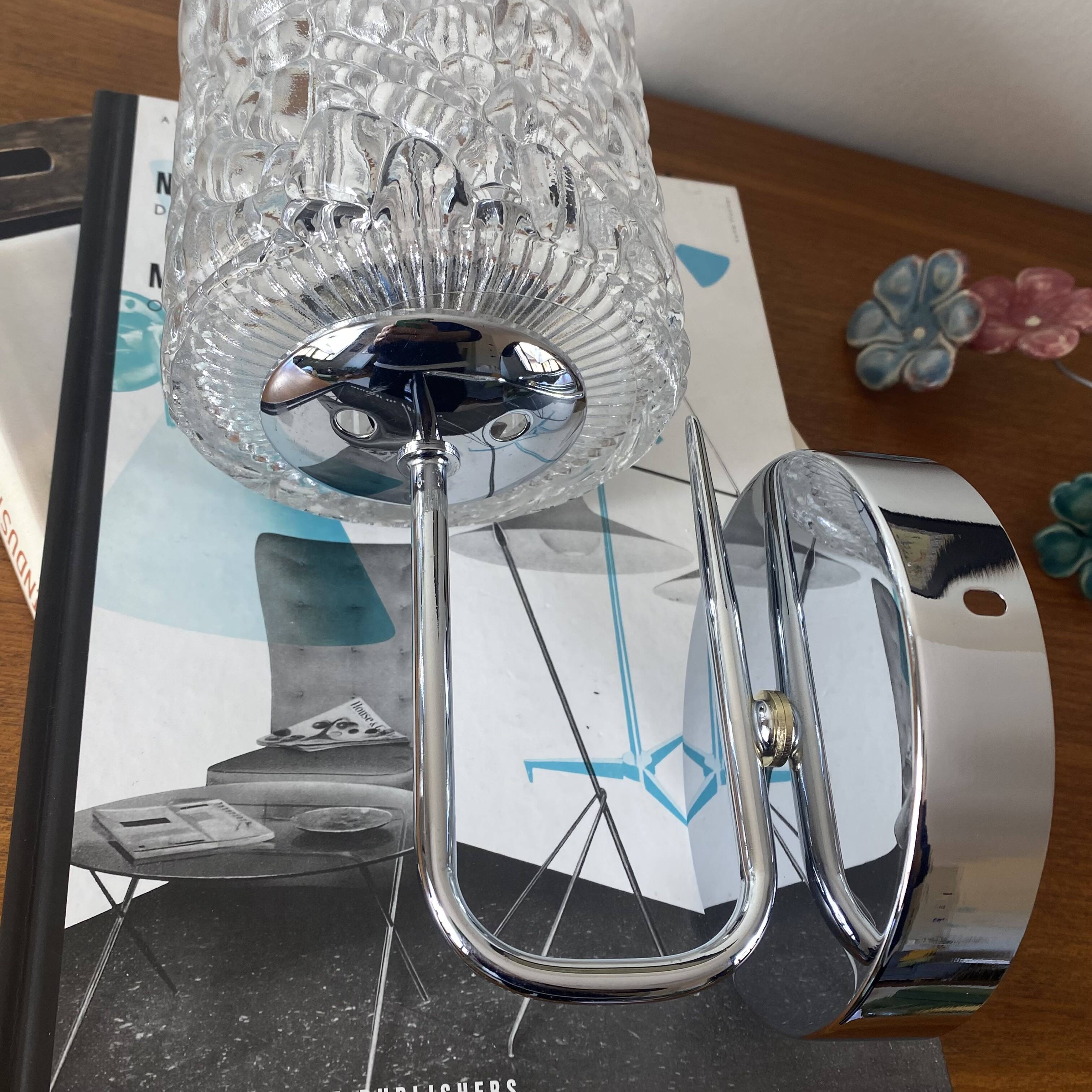 Swan neck wall light in stainless steel, thick glass shade, stainless steel rose.