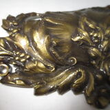 old golden bronze pediment