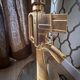 "Lounge Gun" floor lamp by FLOS by Philippe Starck – Gold