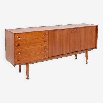 Teak sideboard, with four drawers and two doors. 20th century.