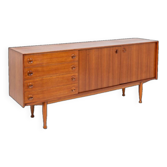 Teak sideboard, with four drawers and two doors. 20th century.