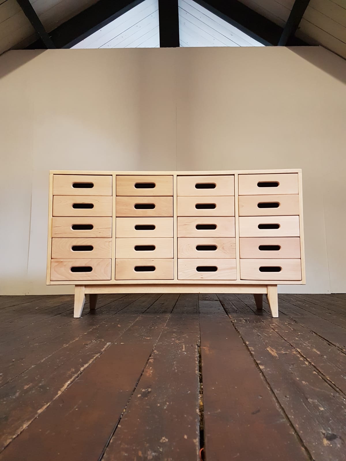 Merchandising chest of drawers by James Leonard Esavian