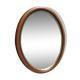 Old oval mirror, walnut wood tower, gilded border