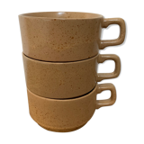 Coffee cups in sandstone