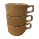 Coffee cups in sandstone