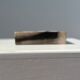 Symmetrical multicolored petrified wood soap dish