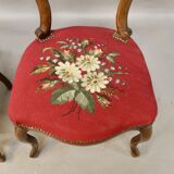 Pair of Louis Philippe walnut chairs, petit point tapestry