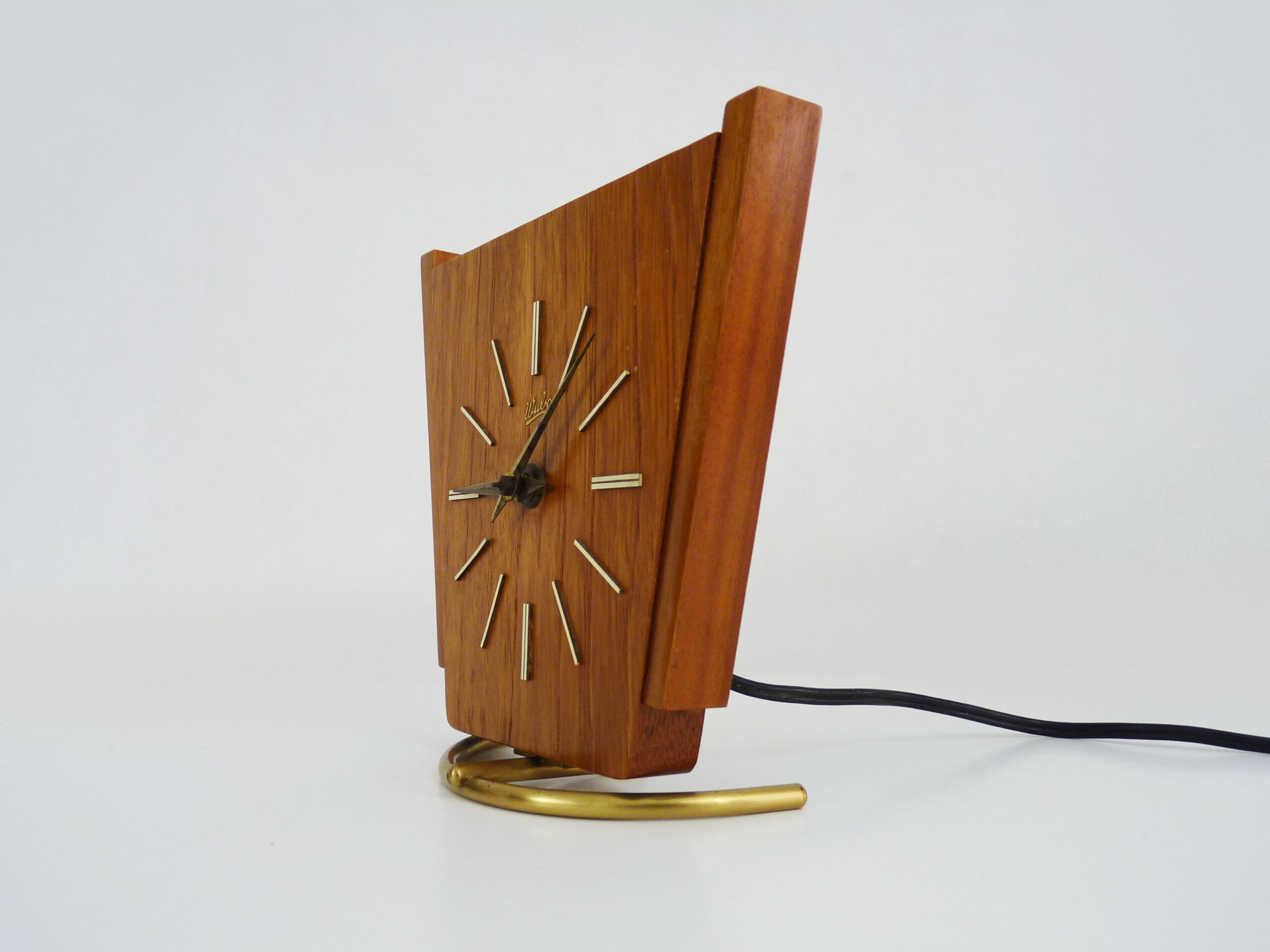 Table clock, art deco clock in Wuba Amsterdam in wood and brass. Year 50