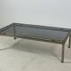 Brass coffee table with smoked glass top by Guy Lefevre, 1970s