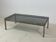 Brass coffee table with smoked glass top by Guy Lefevre, 1970s