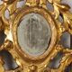 Neoclassical antique mirror in gilded wood, Italy, 18th century.