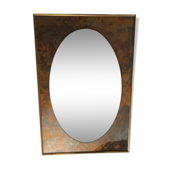 Miroir ovale dans cadre métallique rectangulaire 70x45cm