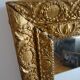 Wood and gilded stucco wall mirror