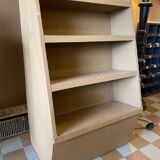 Painted wooden display shelf with an incline