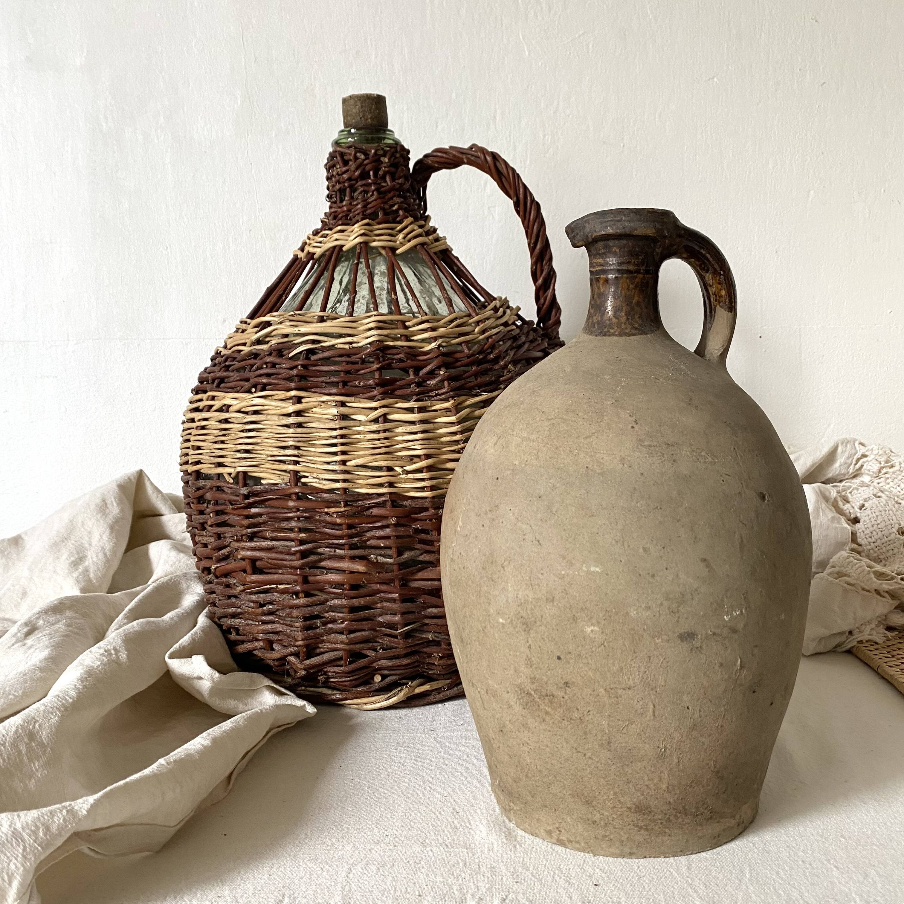 Antique jug, terracotta jar