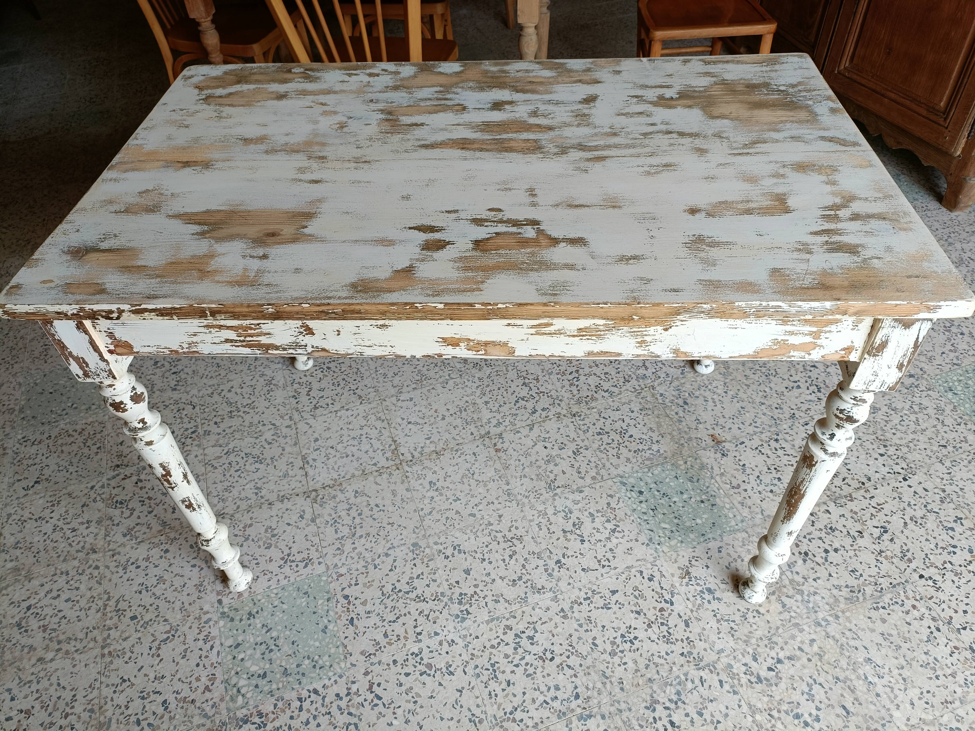 Patinated wooden table, restored.
