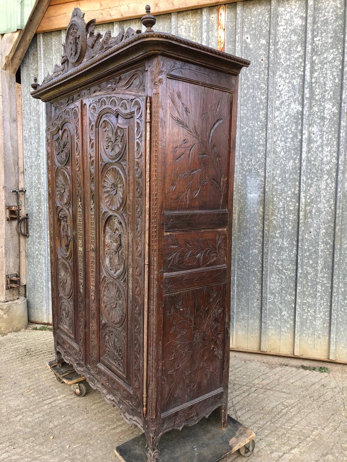 Antique Breton oak cabinet, richly carved