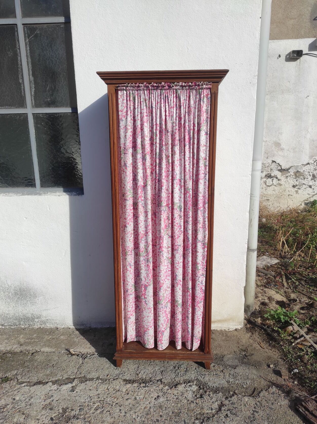 Old wardrobe in old wood and vintage fabric