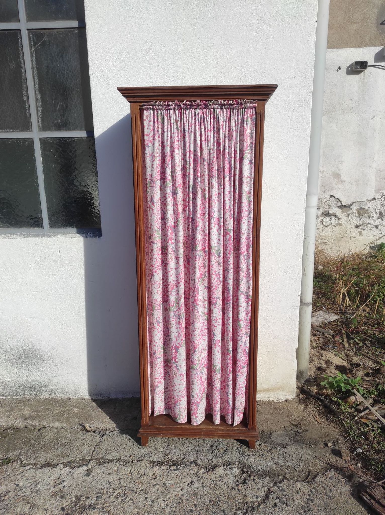 Old wardrobe in old wood and vintage fabric