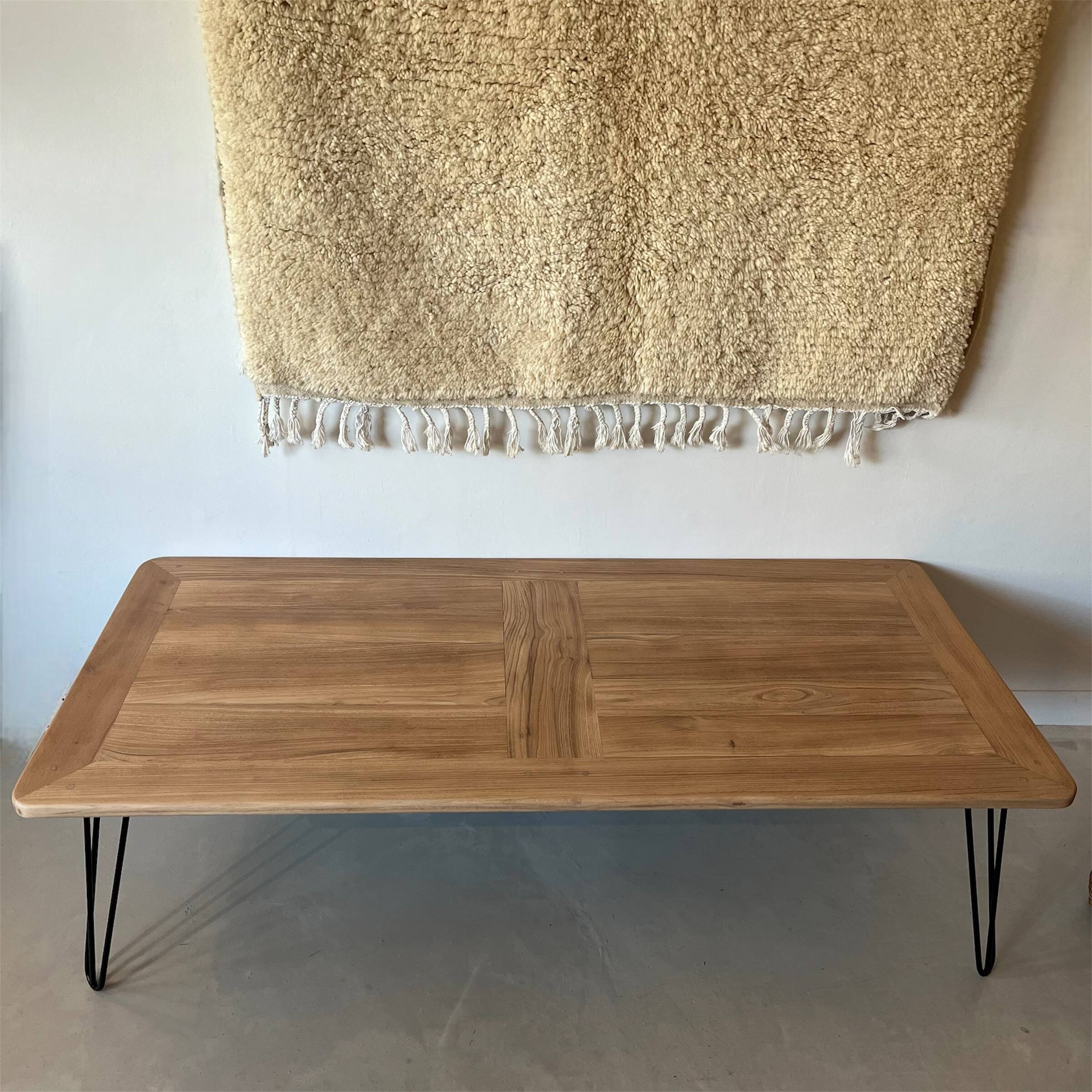 Wooden coffee table with metal legs