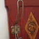 Red wooden wall-mounted coat rack and Art Deco mirror