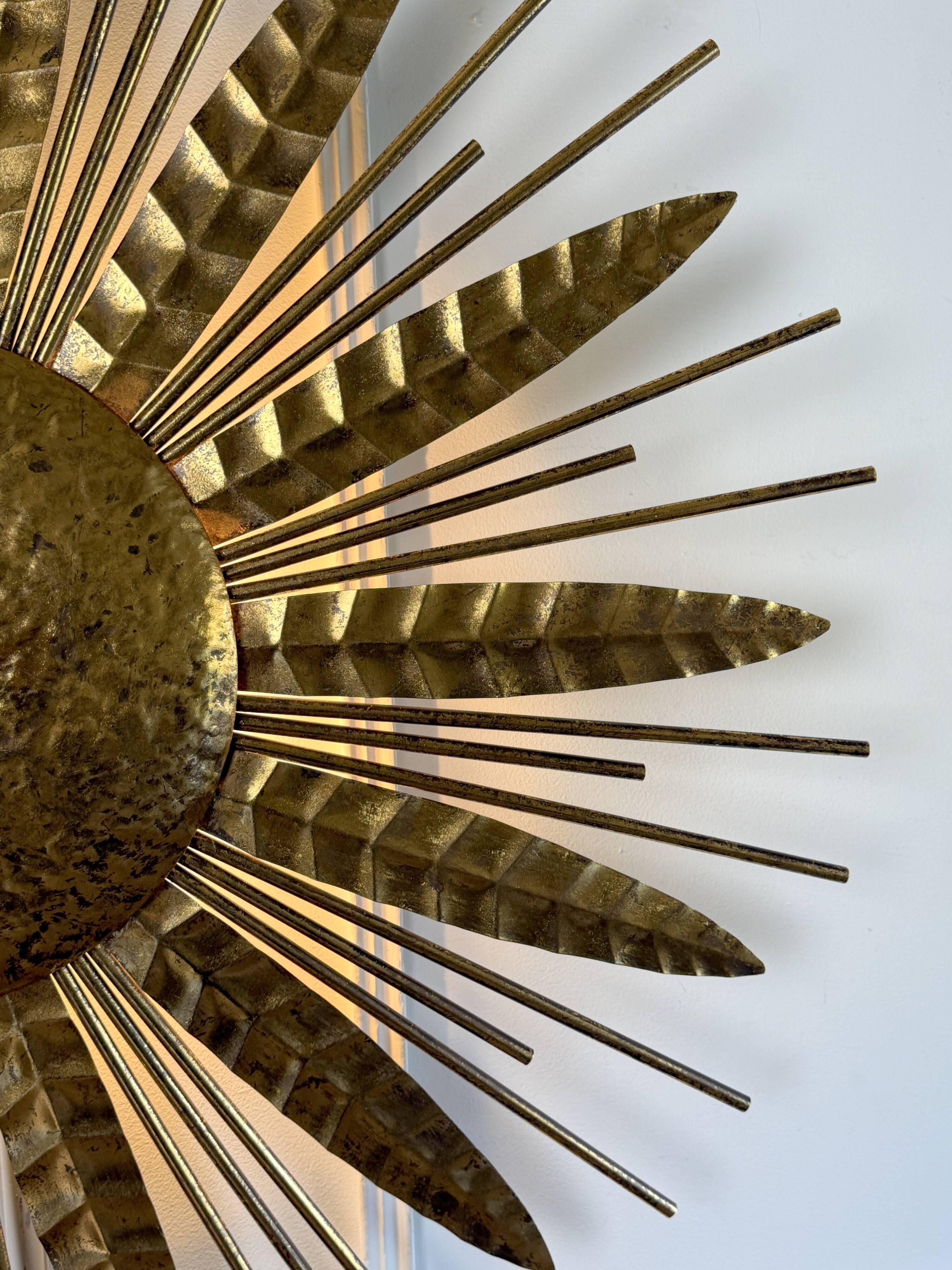 Large golden hammered metal sun wall light with a diameter of 90 cm from the year