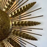 Large golden hammered metal sun wall light with a diameter of 90 cm from the year
