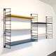 Tomado wall unit with metal shelves by Dekker – Tomado
