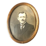 Metal gold colored oval picture frame brass