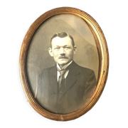Metal gold colored oval picture frame brass