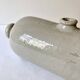 Old horizontal glazed stoneware hot water bottle, late 19th century.