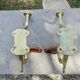 Pair of Art Nouveau coat hooks in bronze and chestnut, circa 1930.
