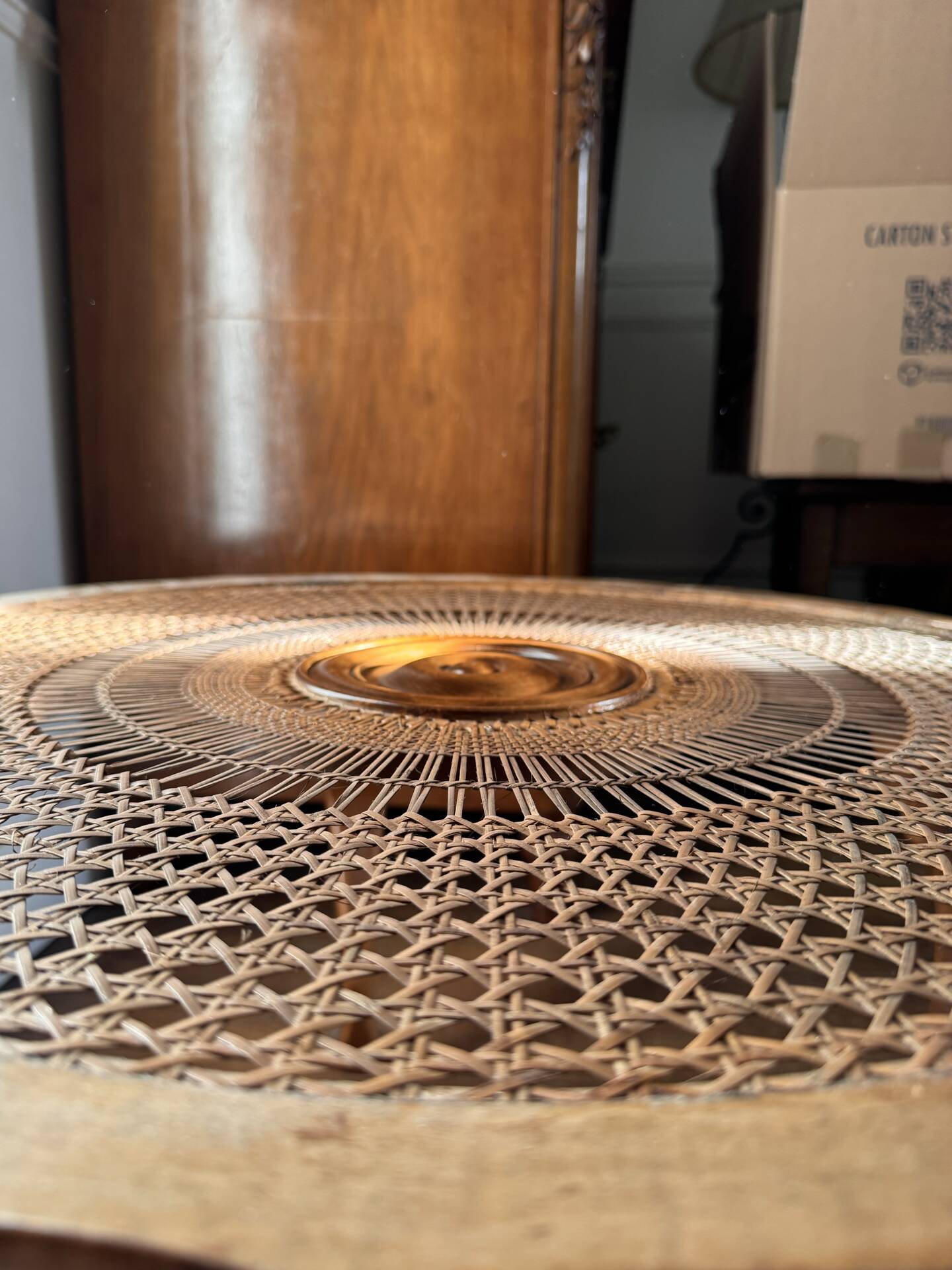 Round coffee table in Louis XV style, with sun cane and glass top.
