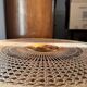 Round coffee table in Louis XV style, with sun cane and glass top.
