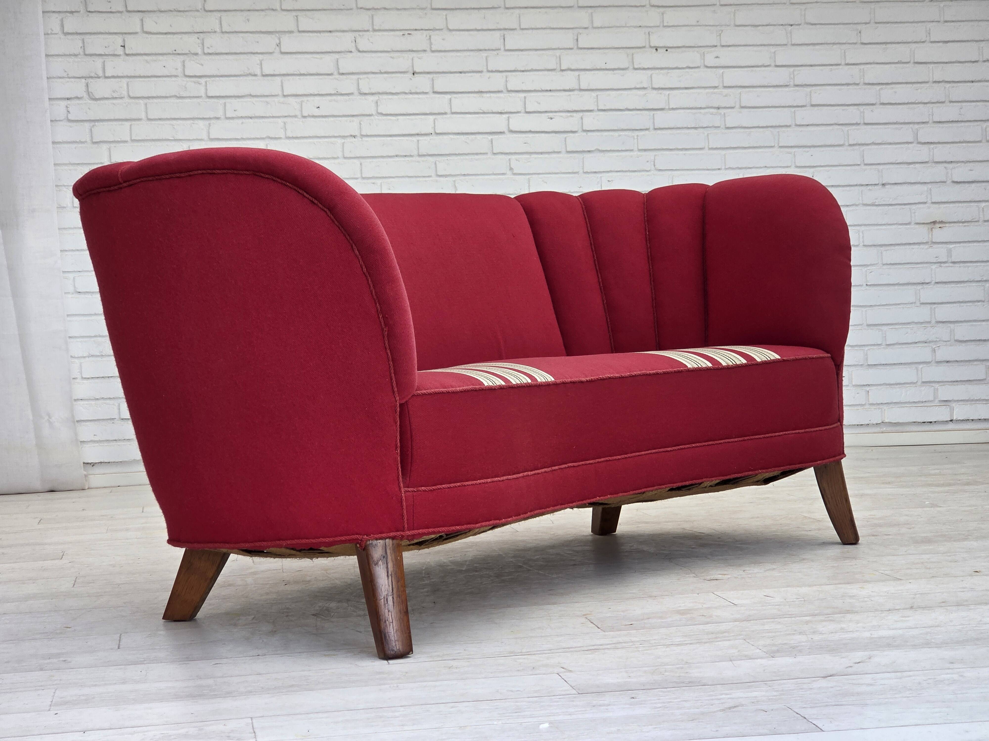 1960s, Danish 2-seater "Banana" sofa, furniture wool, oak wood legs.
