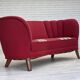 1960s, Danish 2-seater "Banana" sofa, furniture wool, oak wood legs.