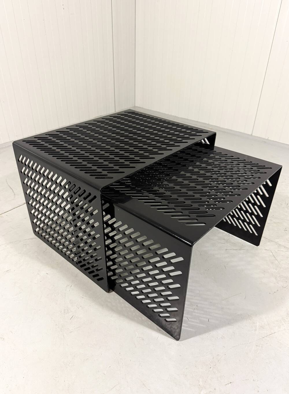Black perforated steel nesting tables Italy 1980’s