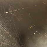 Circular table in blackened wood, central baluster leg
