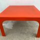 Square orange fiberglass coffee table